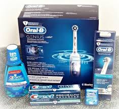 Photo of oral hygiene products such as mouth washes, tooth brushes, and more